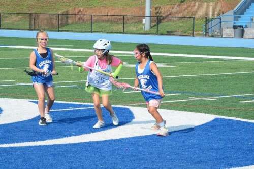 Younger Lacrosse Players Hanging With The Big Kids In Camp